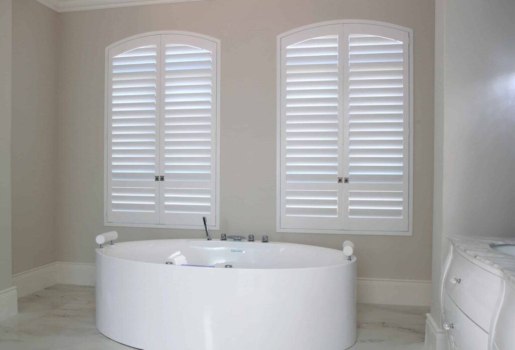 Norman White Arch Shutters Bathroom scaled 1